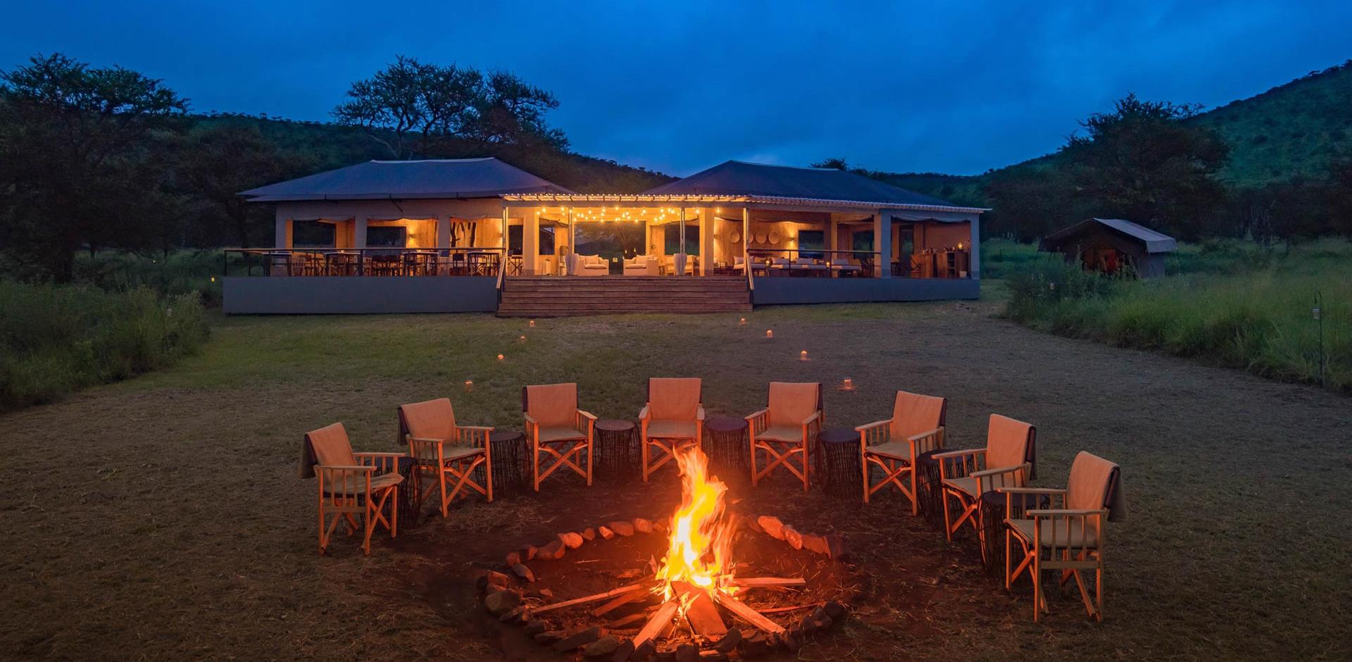 Campfire at night, Dunia Camp, Tanzania, A&K