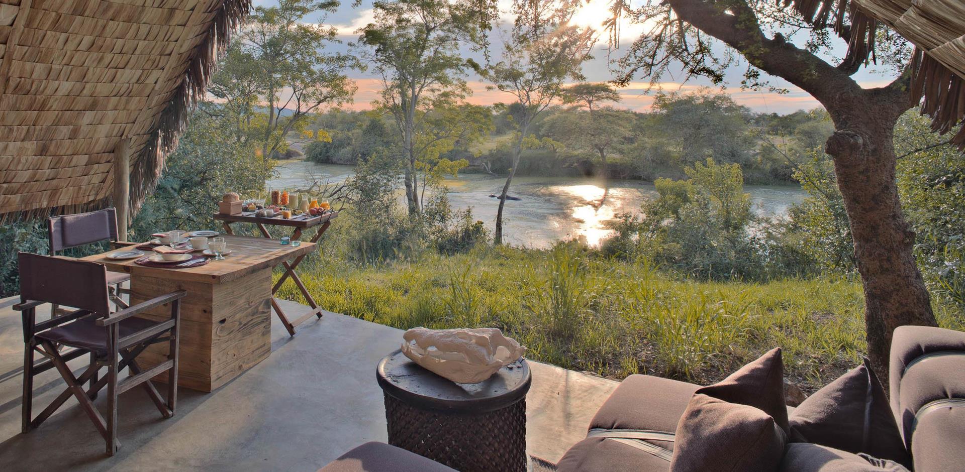 Outdoor dining, andBeyond Grumeti Serengeti River Lodge, Tanzania, A&K