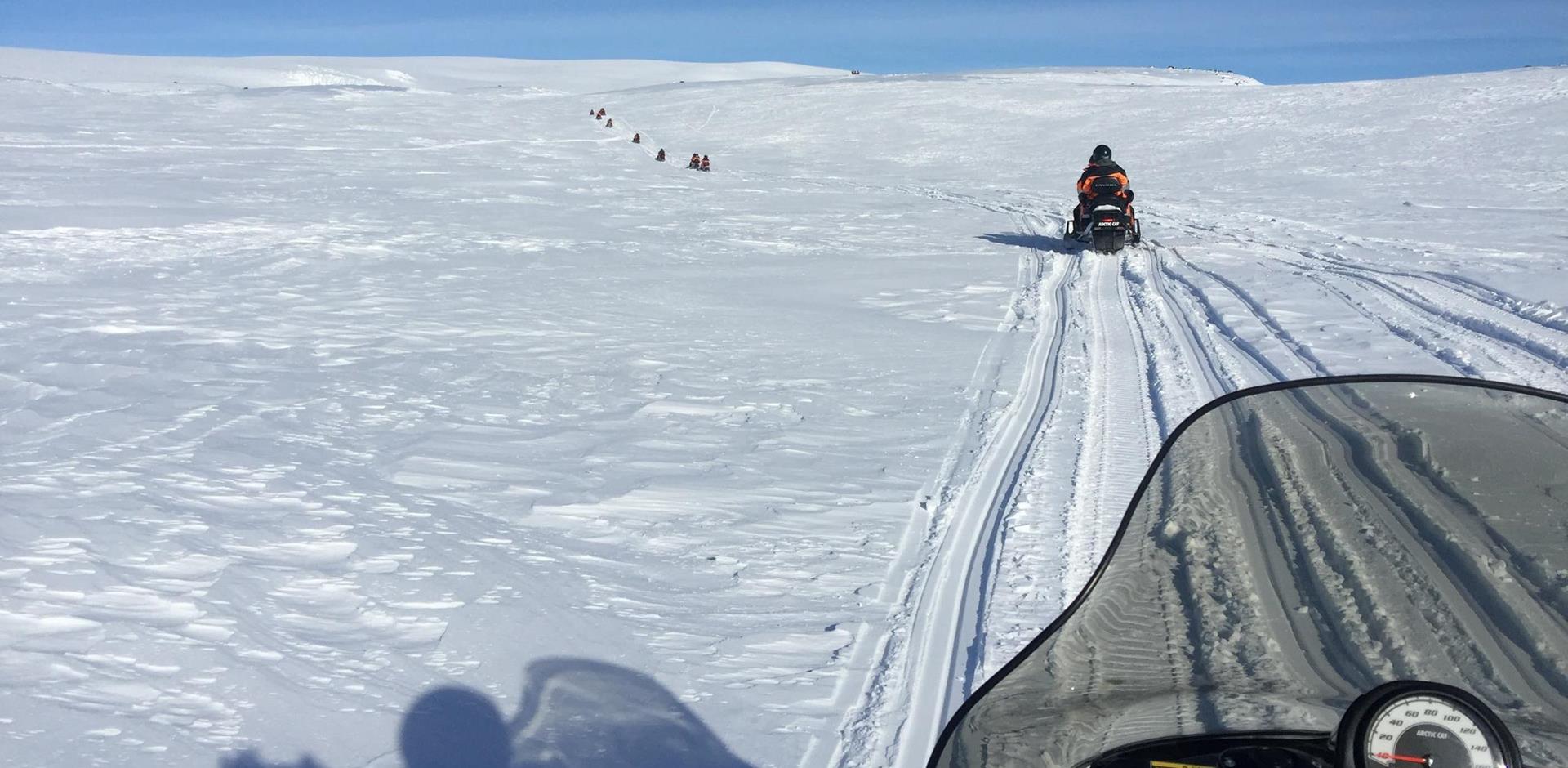 Explore Icelands glacier by snowmobile